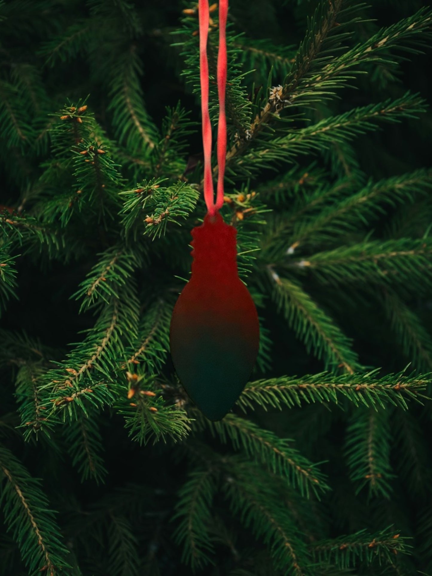 Red green glitter light bulb ornament