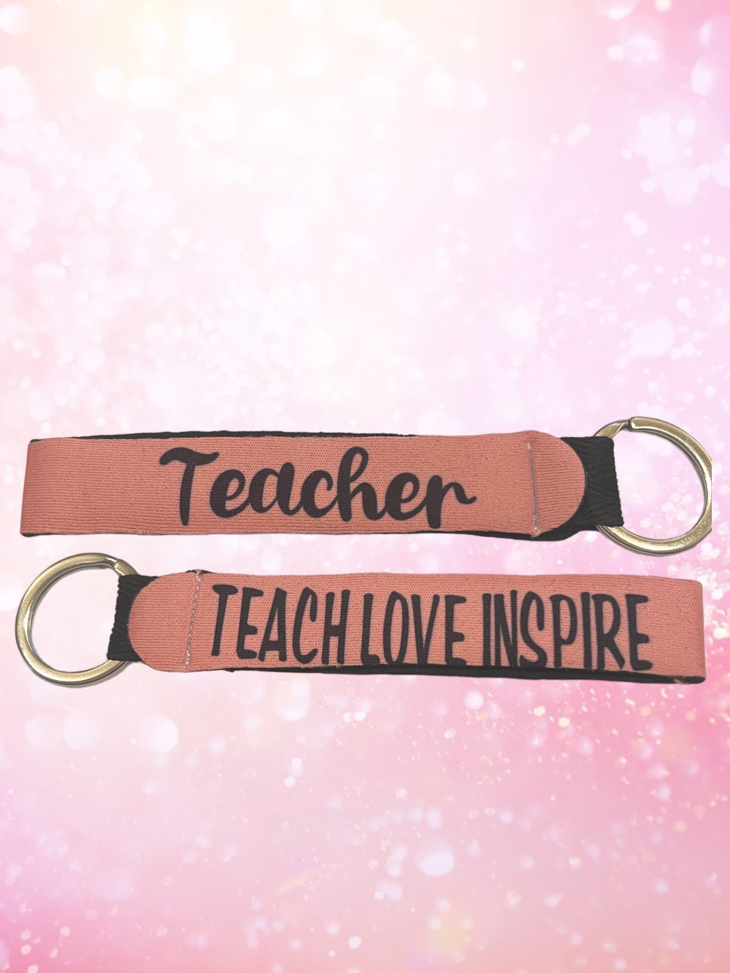 Teach love inspire wristlet