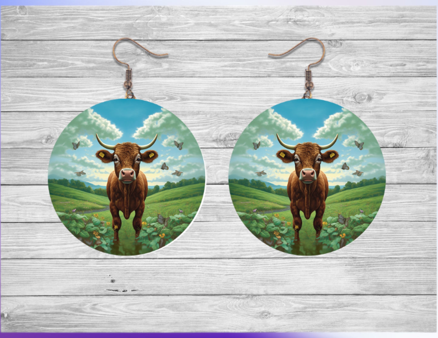 Cow in field round earrings