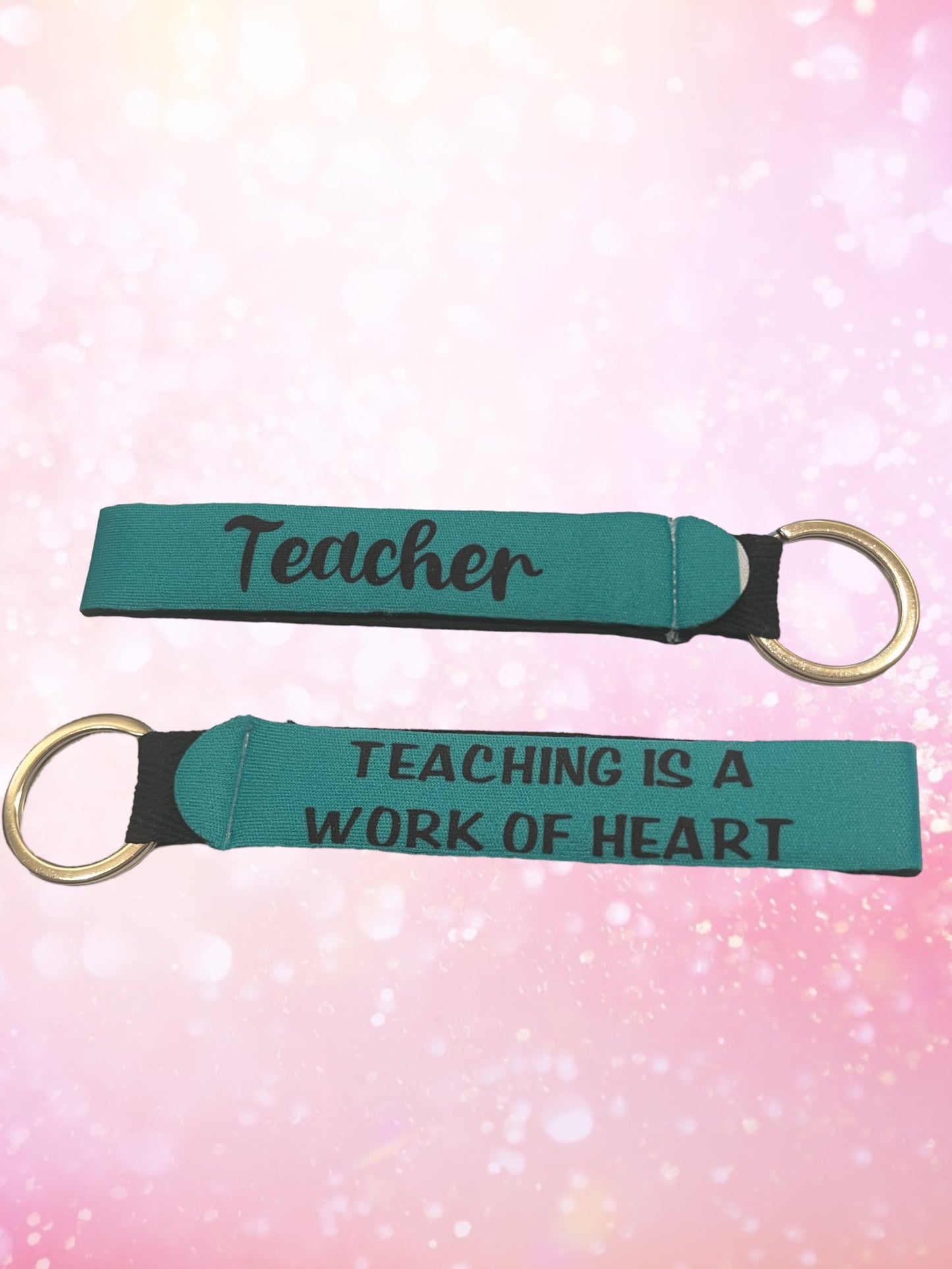 Teaching is a work of heart wristlet