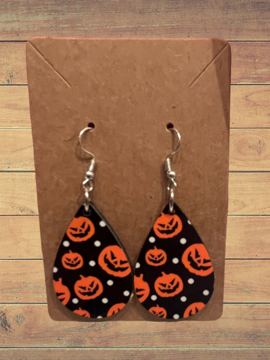 Black with orange pumpkins tear drop earrings