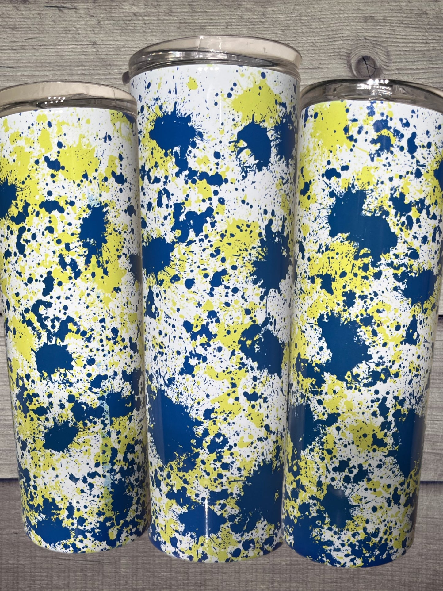 Blue and yellow paint splatter 20oz tumbler