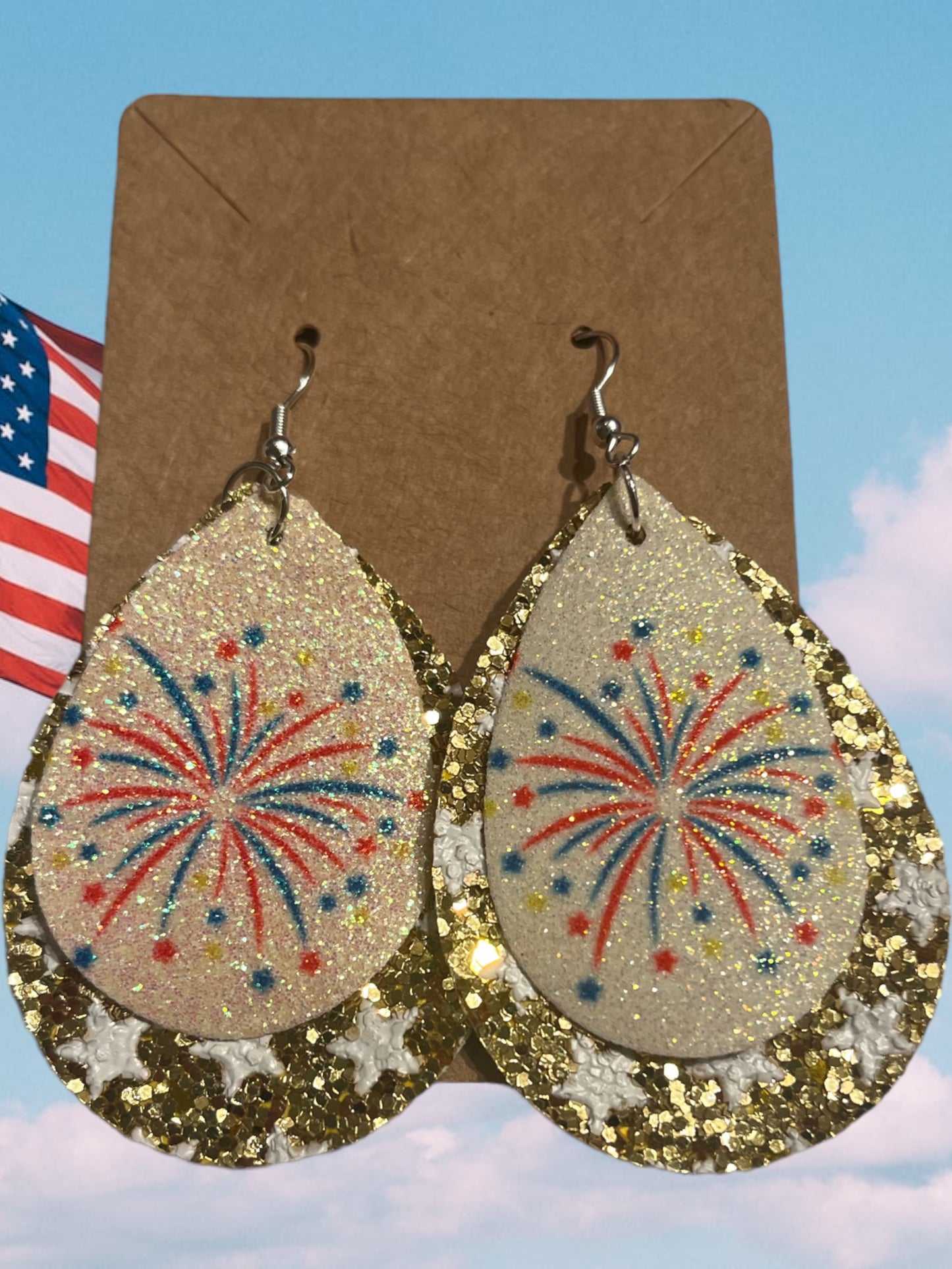 Fireworks faux leather tear drop earrings