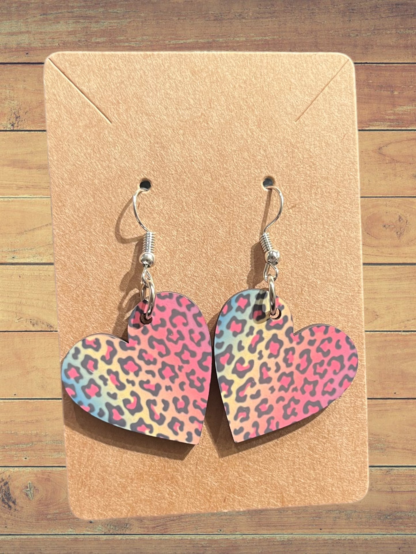 Rainbow cheetah print heart earrings