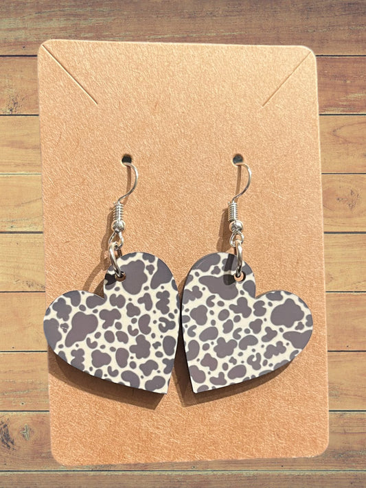 Cow print heart earrings